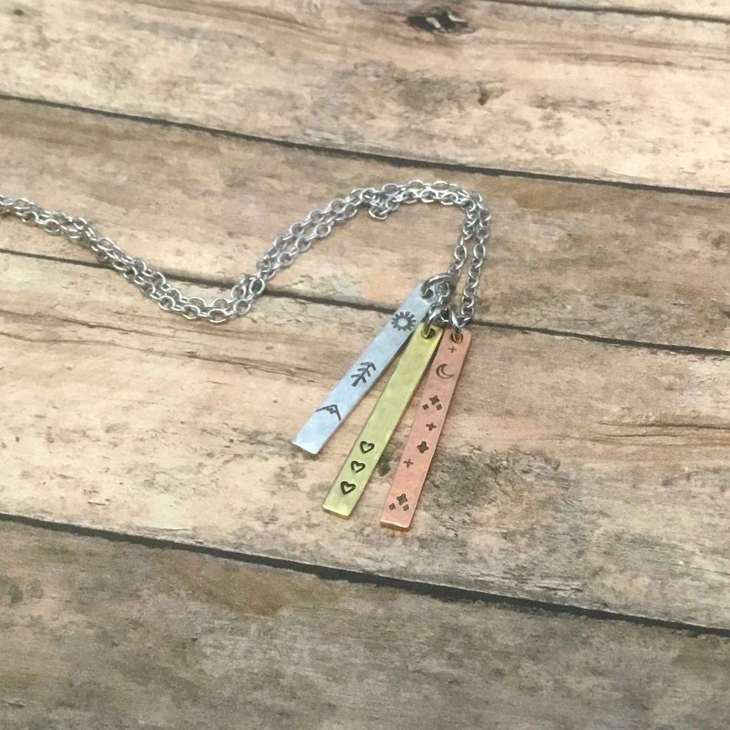 Sun, moon, and hearts trio, mixed metal charm necklace