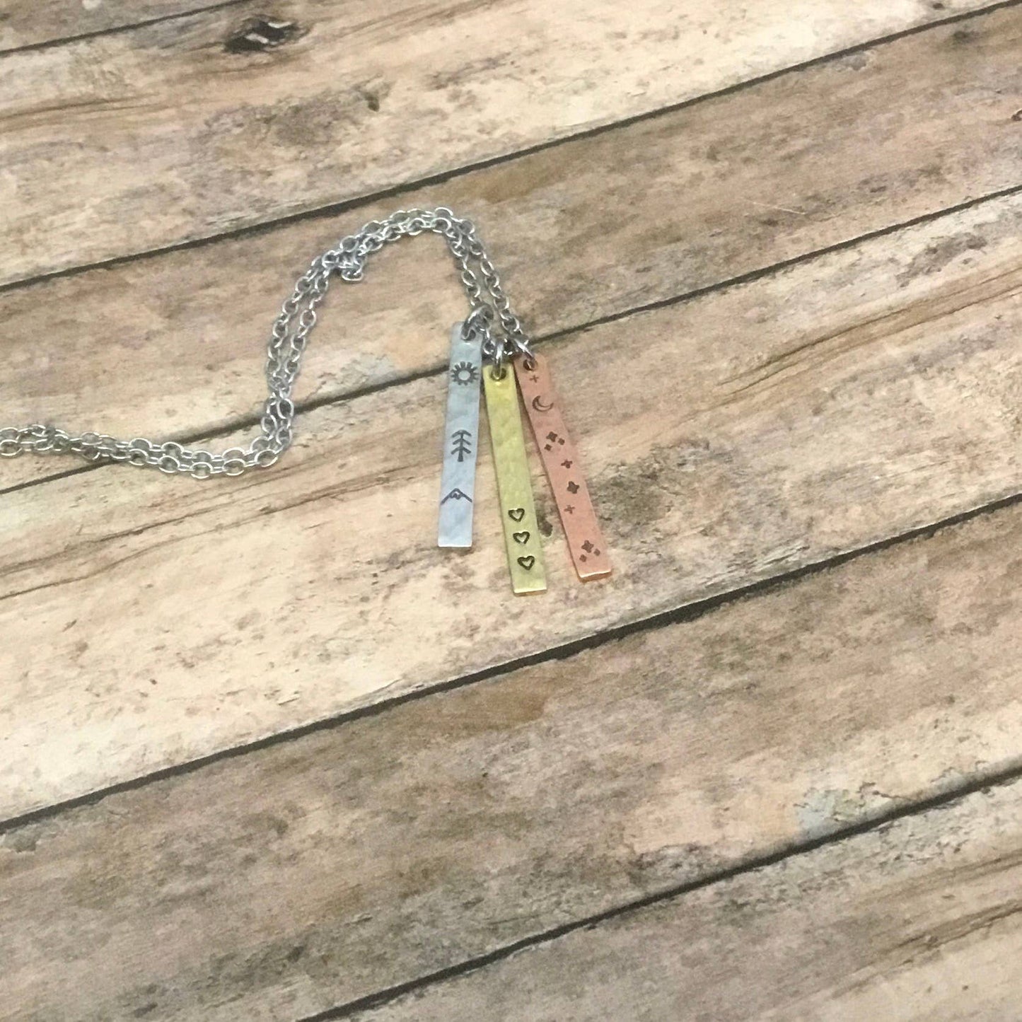 Sun, moon, and hearts trio, mixed metal charm necklace