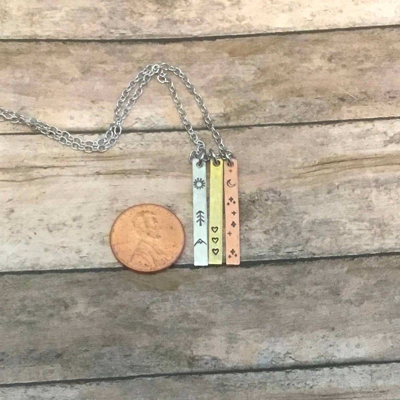 Sun, moon, and hearts trio, mixed metal charm necklace
